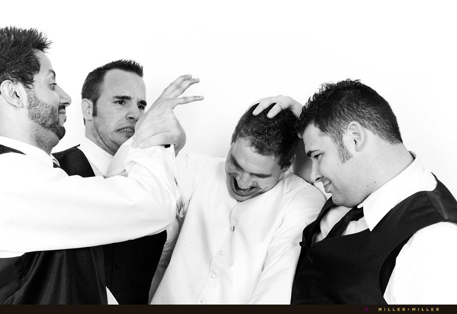 groomsmen attack groom black white picture