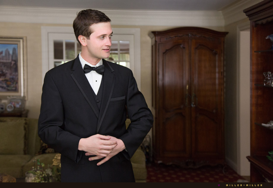 groom black suit bow tie