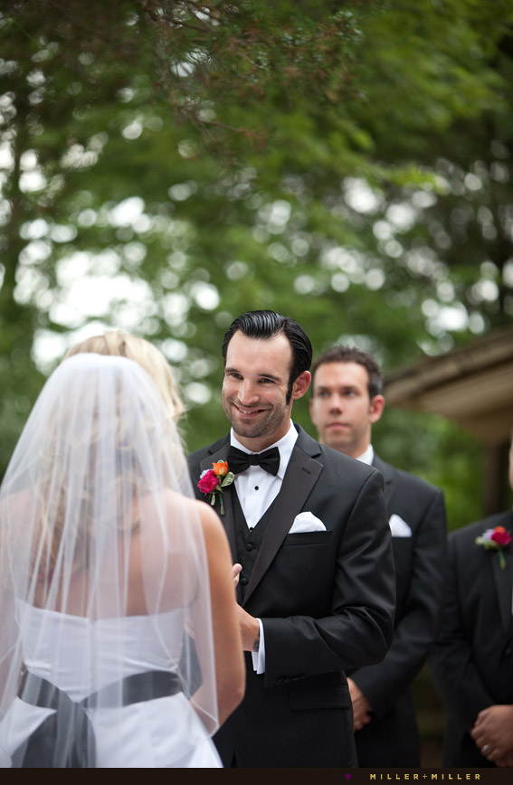 groom vows smiling